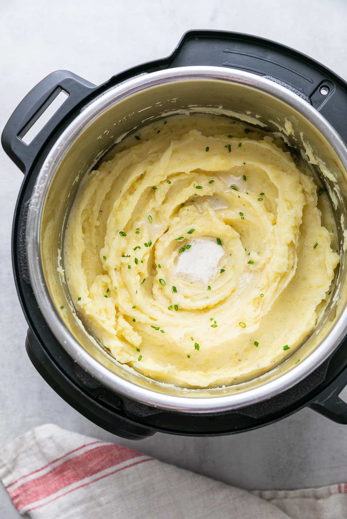 top down view of instant pot with freshly made vegan Instant Pot mashed potatoes.