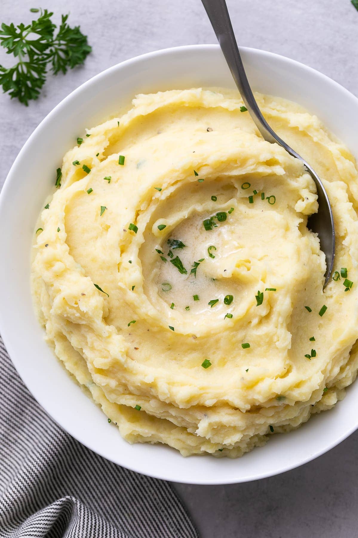 top down view of serving bowl filled with the best Instant Pot mashed potatoes.