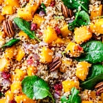 a close up top view of butternut squash and quinoa salad