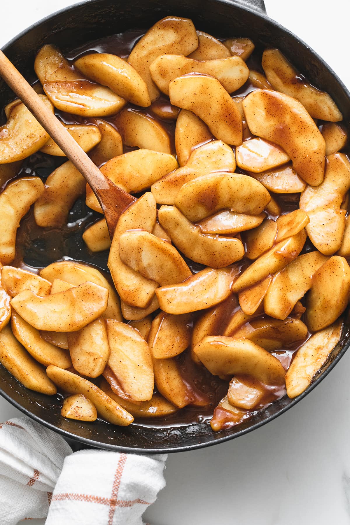 top down view of skillet with warm cinnamon apples.