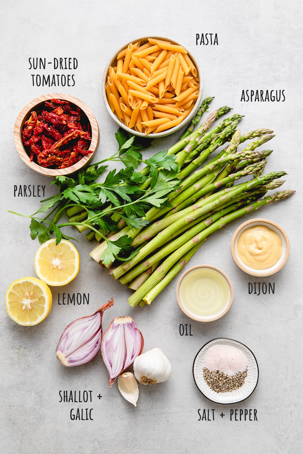 top down view of ingredients used to make asparagus pasta.