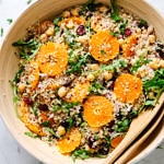 top down view of quinoa salad with orange, cranberry and mint freshly tossed and ready to serve.