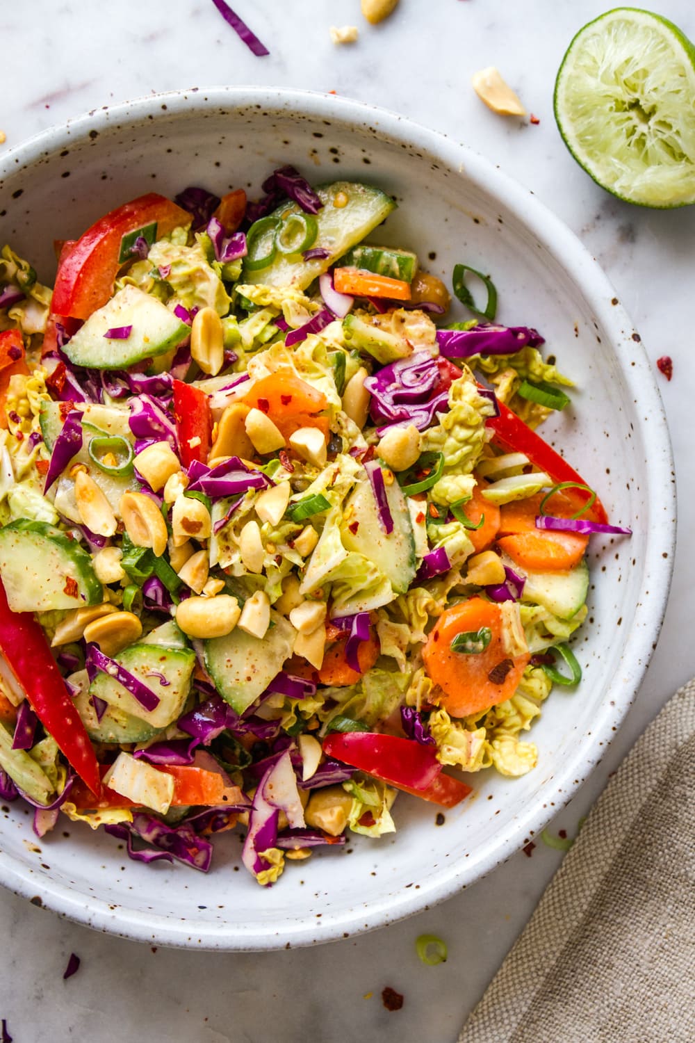 top down, up close, view of thai crunch salad served in a rustic bowl