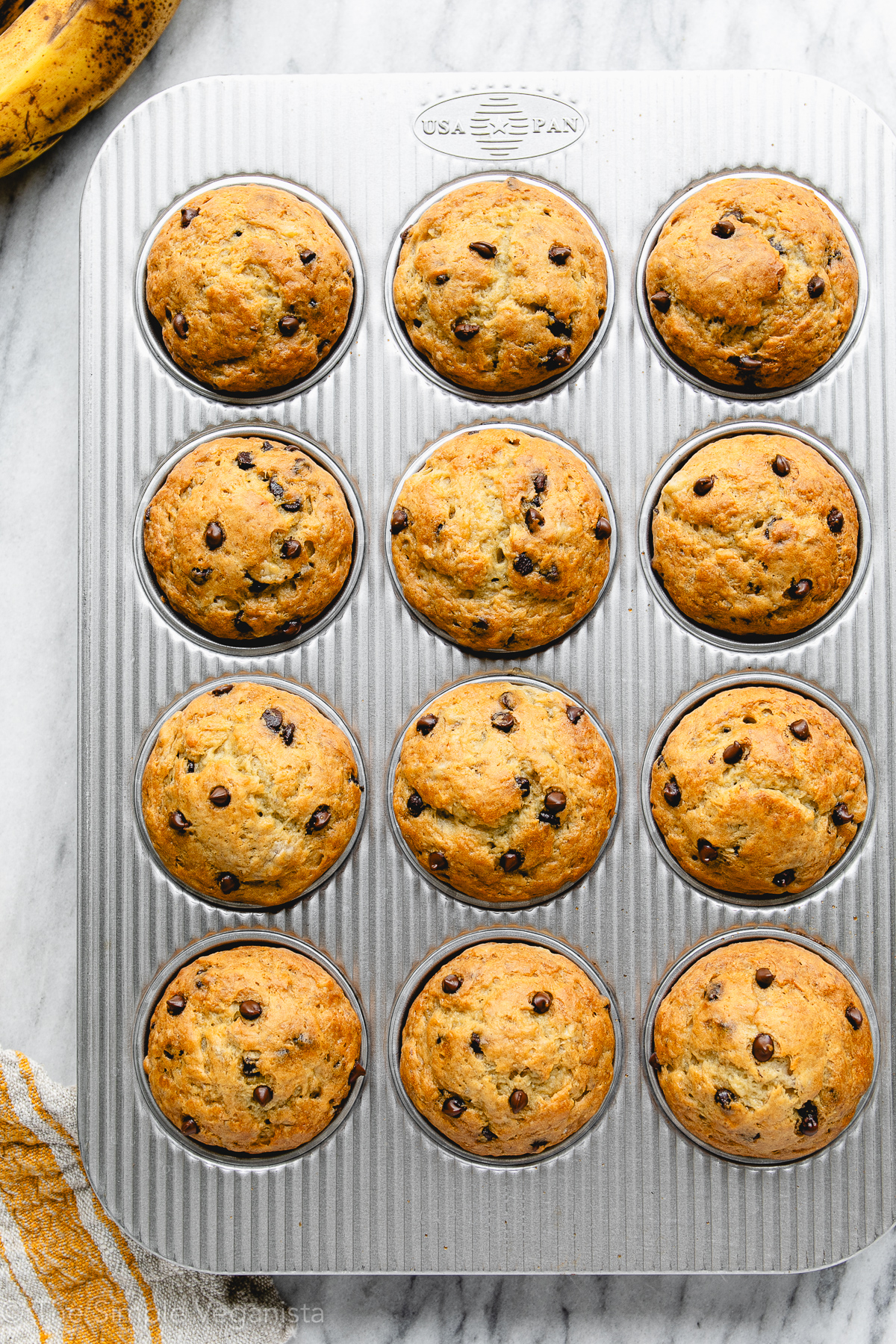top down view of freshly made muffins in a muffin tin.