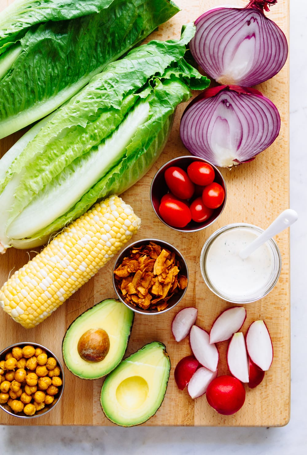 top down view of ingredients used to make a vegan cobb salad.