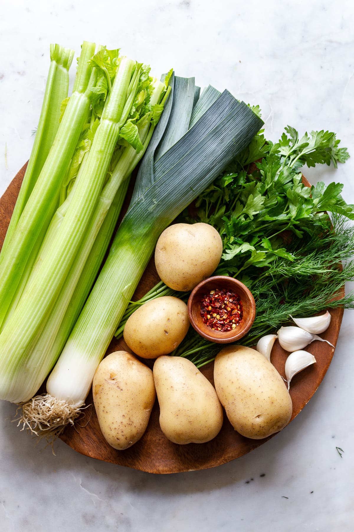 top down view of ingredients needed to make delicious celery soup.