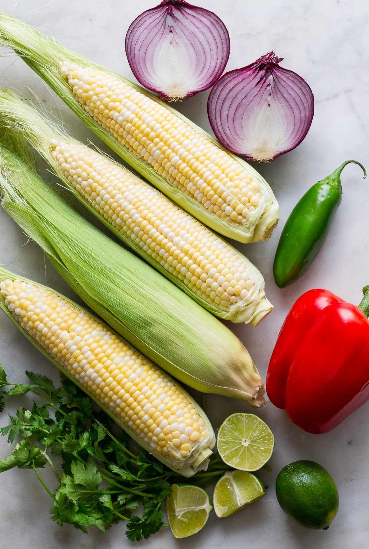 top down view of ingredients used to make best corn salsa recipe.