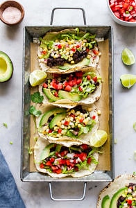 top down view of easy black bean tacos on a serving tray.