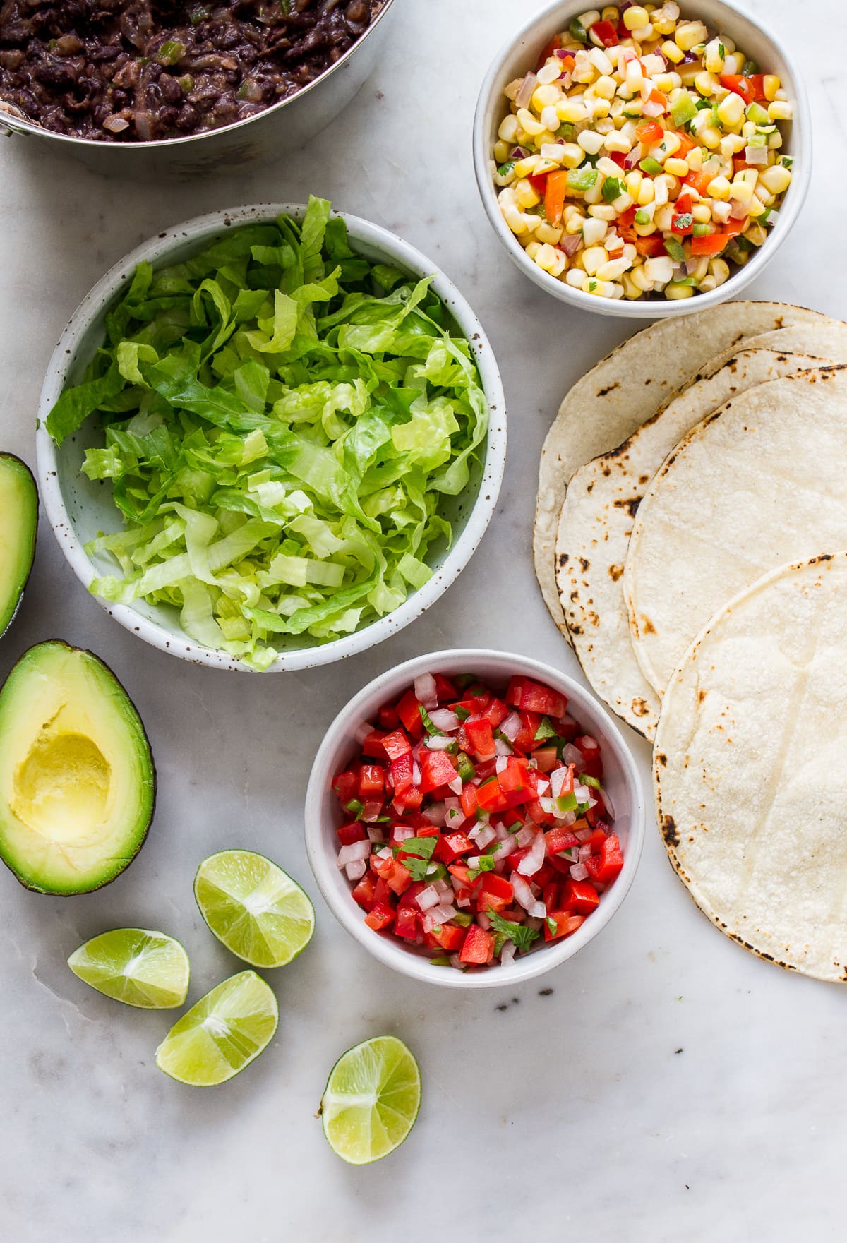 top down view of ingredients for vegan black bean tacos.