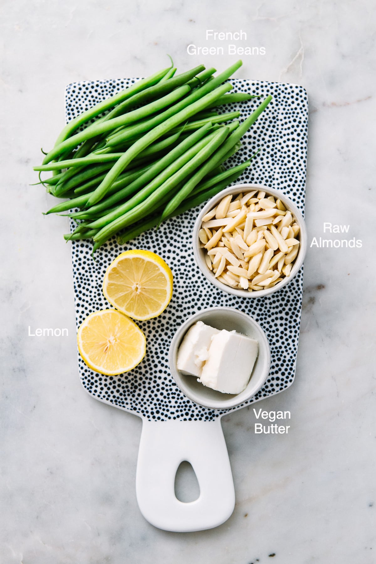 top down view of ingredients needed to make easy green beans almondine recipe.