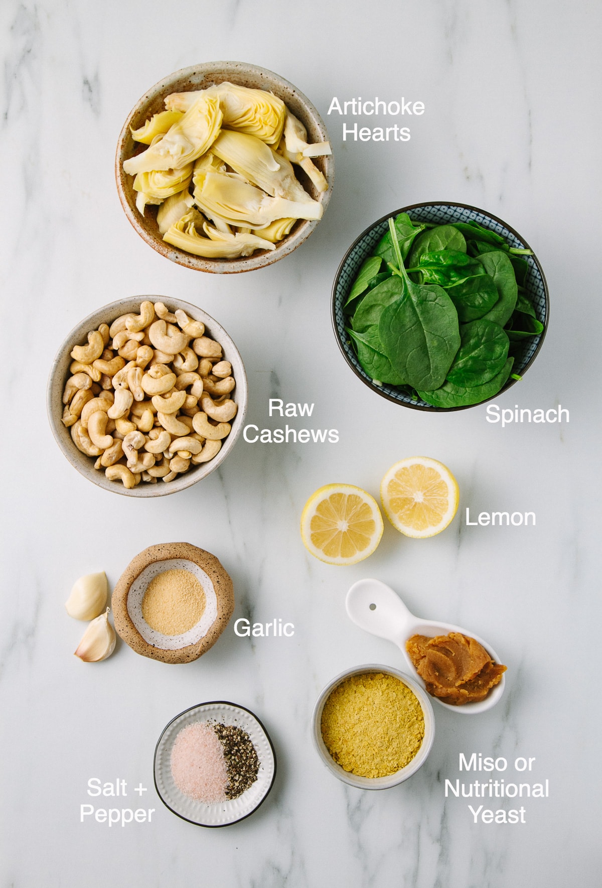 top down view of ingredients used to make vegan artichoke spinach dip.