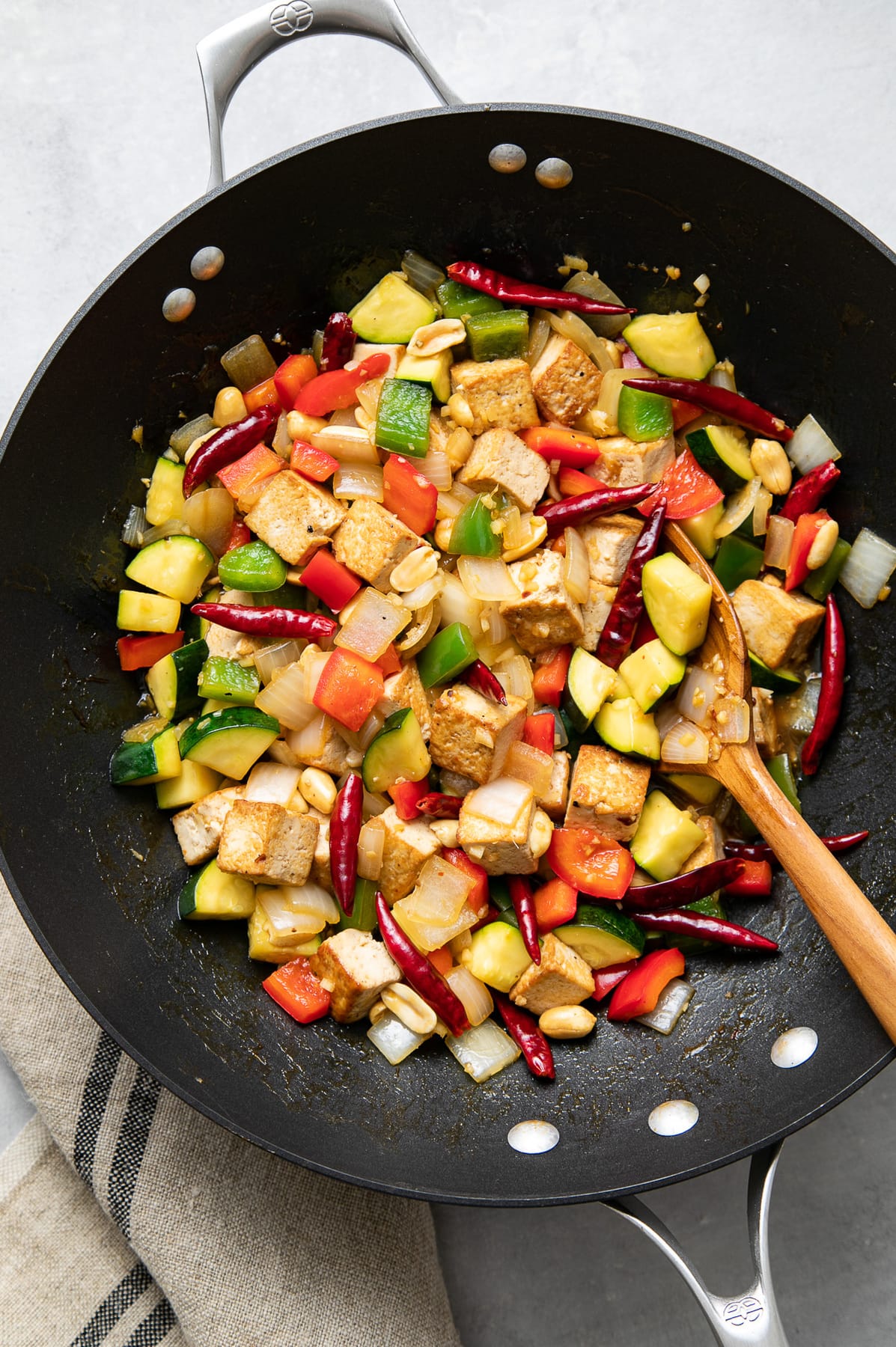 top down view of freshly made kung pao tofu in a wok.