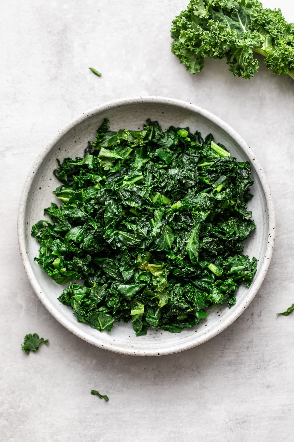 top down view of sauteed kale in a bowl.