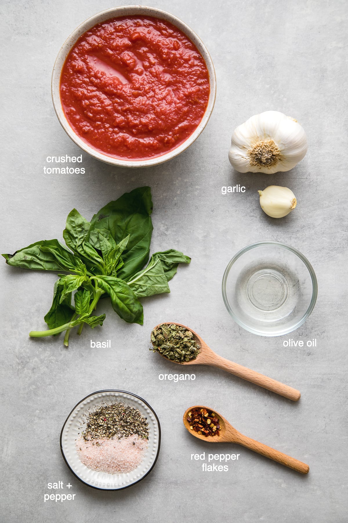 top down view of ingredients used to make the best homemade marinara sauce.