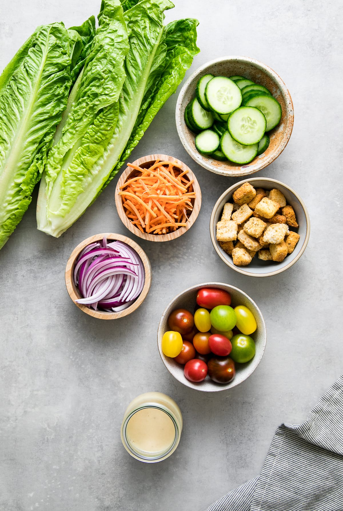 top down view of the ingredients used to make the best house salad recipe.