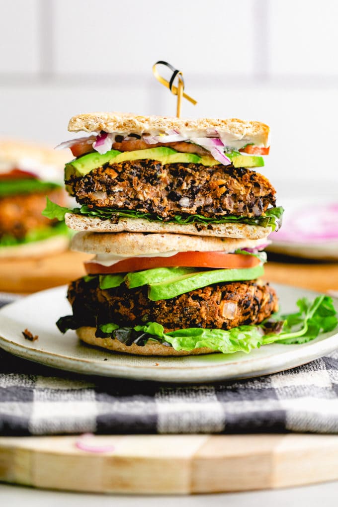 head on view of sliced and stacked vegan black bean burger.