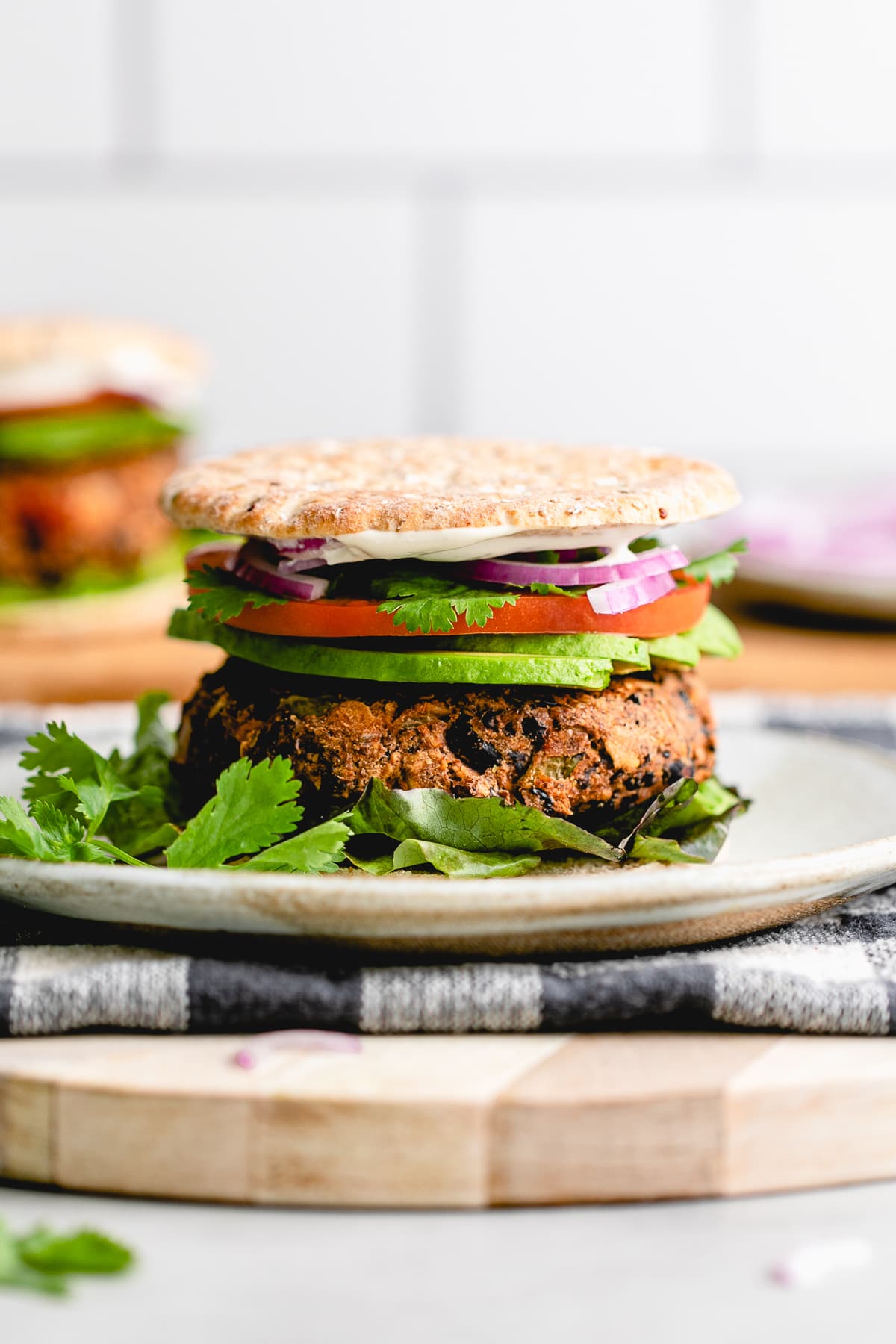 head on view of plated vegan black burger.