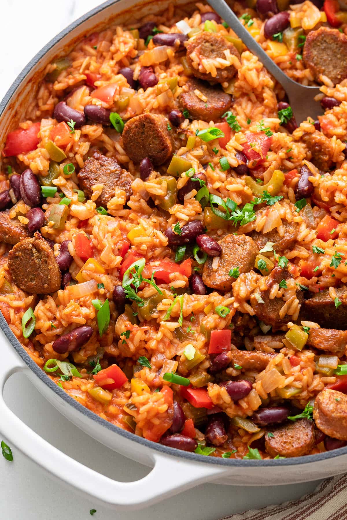 side angle view of fresh made vegan jambalaya in a pan.