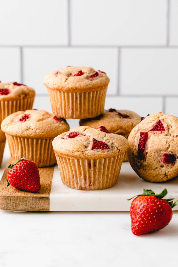 head on view of group of healthy strawberry muffins.
