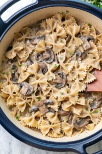 top down view of pot with freshly made creamy mushroom pasta.