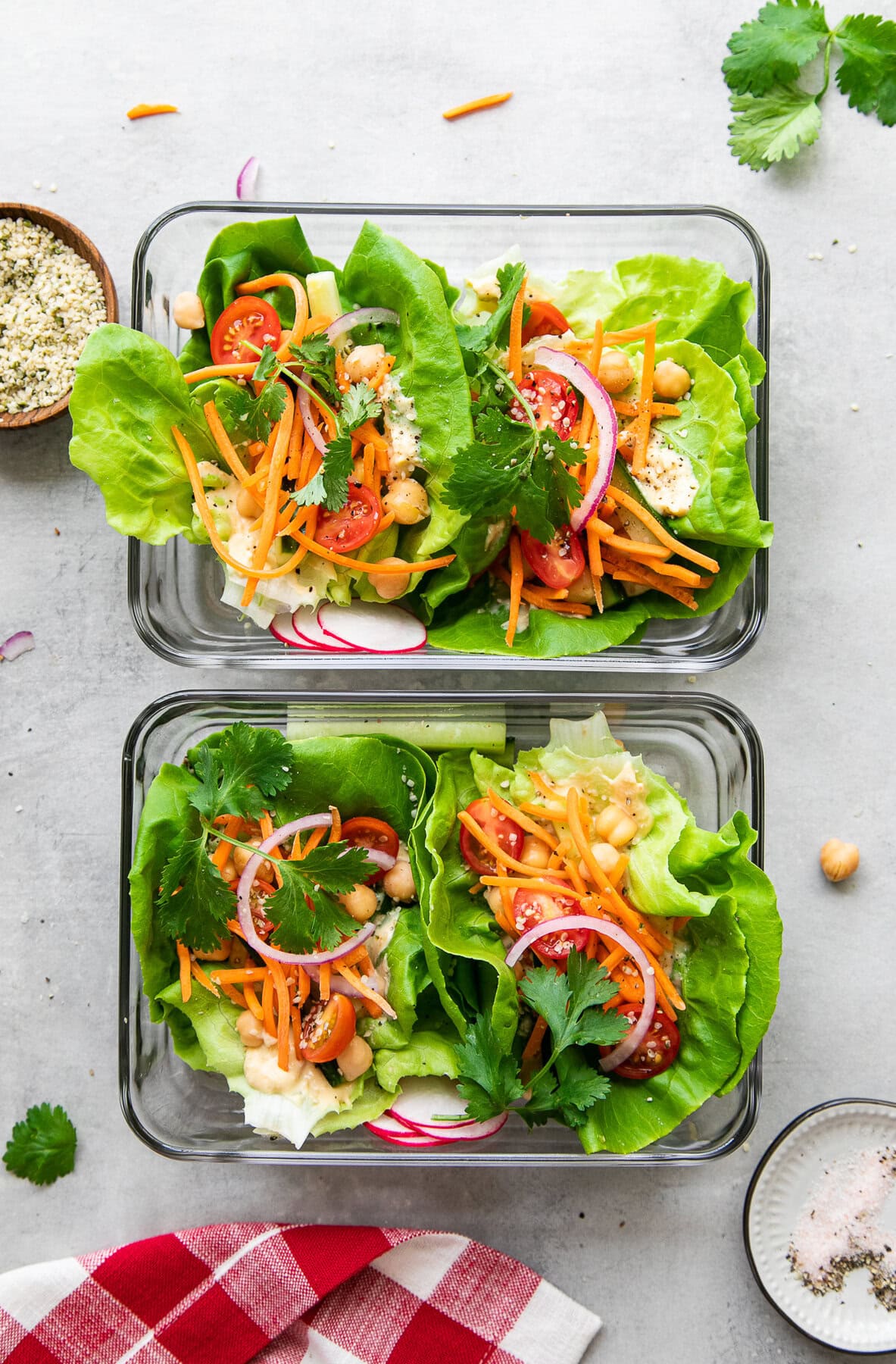 vegan meal prep in containers with fresh lettuce wraps.