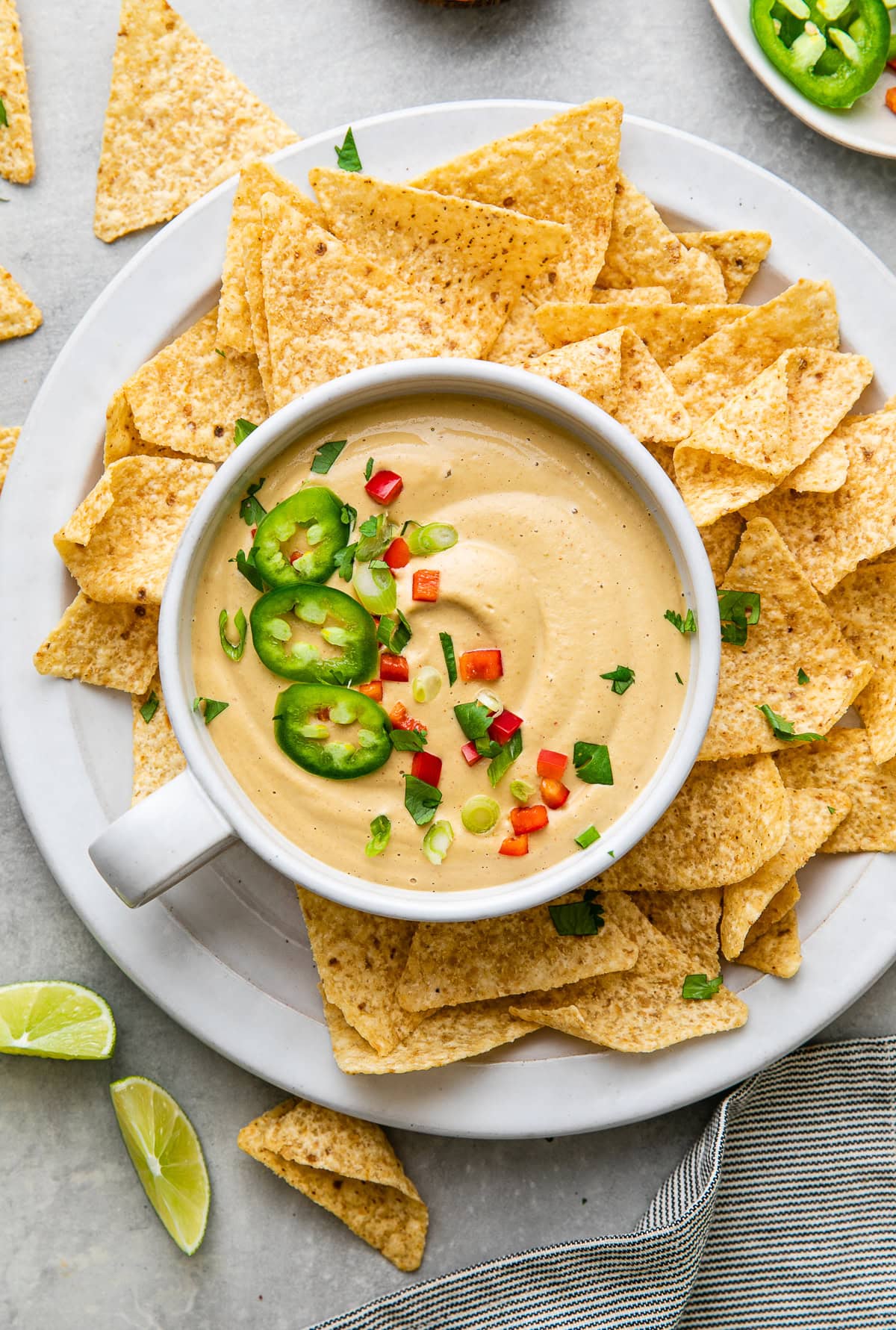 vegan cashew queso dip spread with tortilla chips.