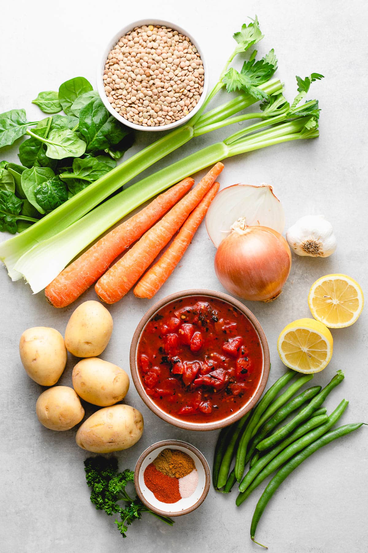 variety of fresh produce, lentils, and spices.