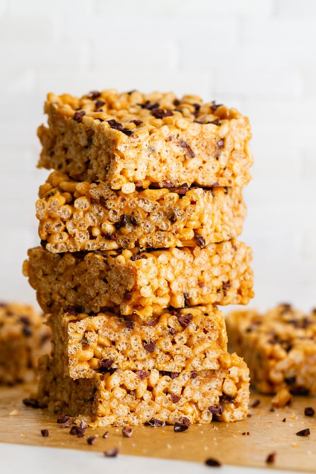 stacked no-bake peanut butter and cacao nibs rice krispy treats.
