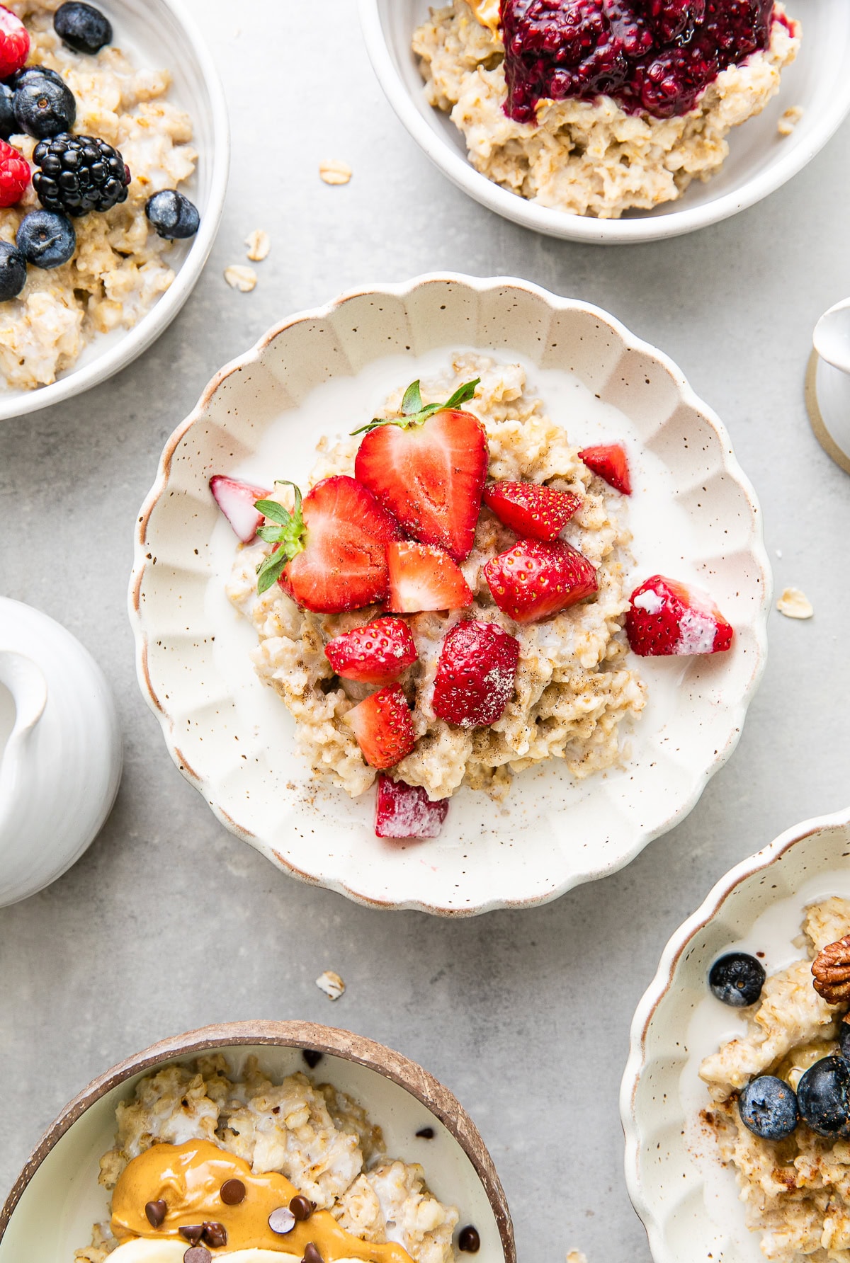 vegan oatmeal with strawberries and oat milk.