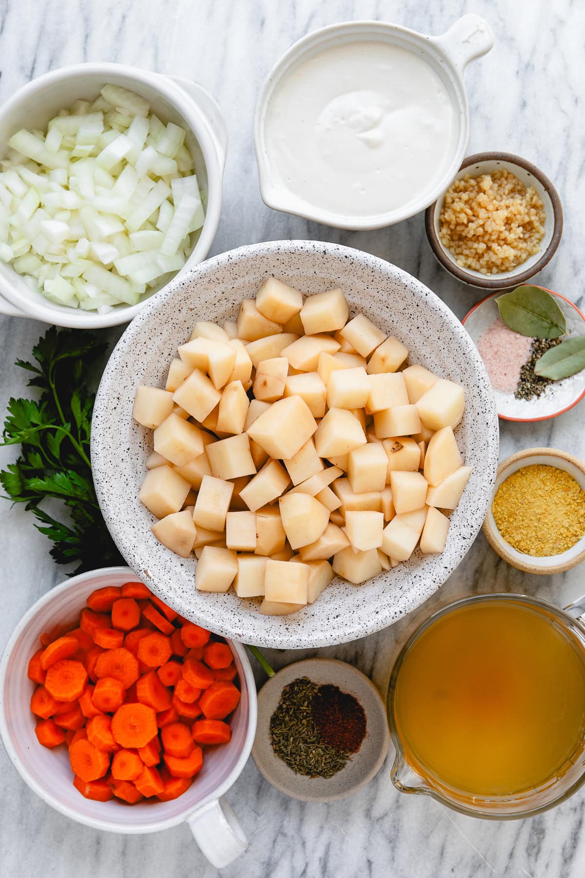 top down view of ingredients used to make vegan potato soup.